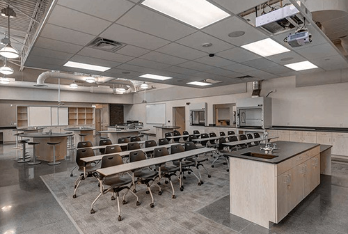 Science classroom with projectors and drop ceiling for AV and acoustical requirements